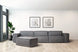foto ambientada do sofá cinza 1 lugar módulo central maraú na cor cinza claro visto de frente em sala de estar