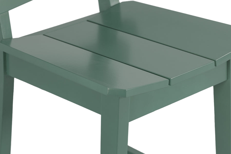 foto da banqueta para balcão alta uma na cor verde escuro focando no assento em fundo branco