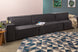 foto ambientada do sofá modular 1 lugar módulo central maraú na cor grafite visto na diagonal em sala de estar