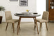 foto ambientada mesa para cozinha de jantar redonda biscoito fino grafite com duas cadeiras bege
