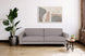 foto ambientada do sofá de sala 3 lugares nairóbi cinza claro em sala de estar com planta ao lado