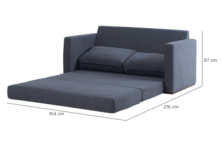 sofa cama vira grafite aberto como cama visto na diagonal com medidas descritas na imagem